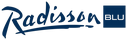 The Radisson Blu hotel logo is displayed in a sleek, blue script with a distinctive underline.